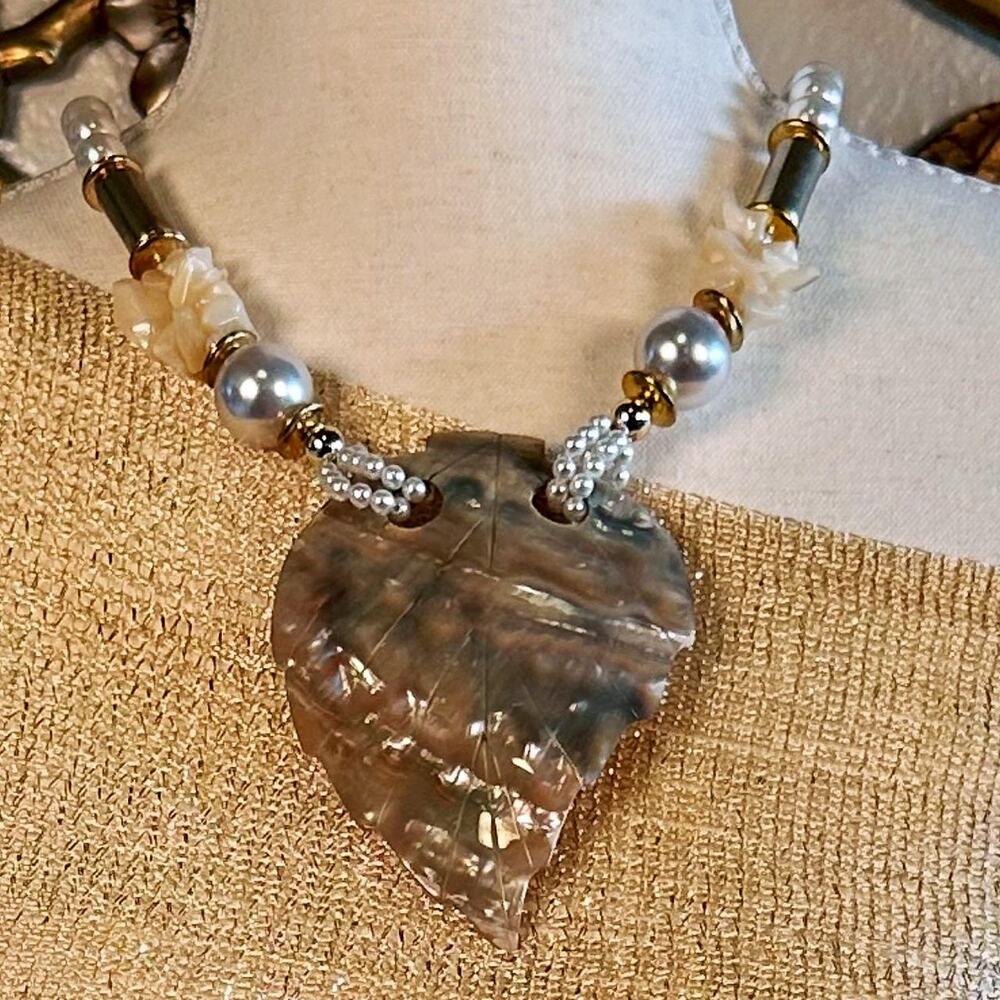 Vintage statement necklace featuring a leaf shaped abalone shell